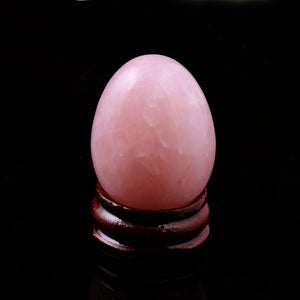 Pink Quartz Yoni Egg with Brown Stand